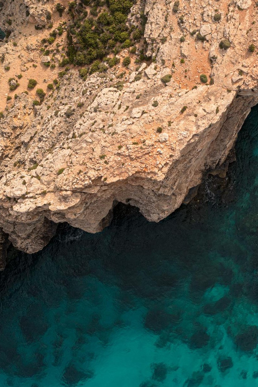 Blue Lagoon, Crystal Lagoon & Comino Caves Private Boat Tour - Saint Mary’s Tower gives Comino its historic face
