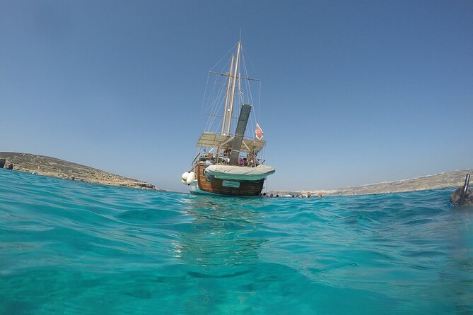 Blue Lagoon: Full-Day Three Island Cruise: Malta, Gozo and Comino - Blue Lagoon: famous water, busy setting