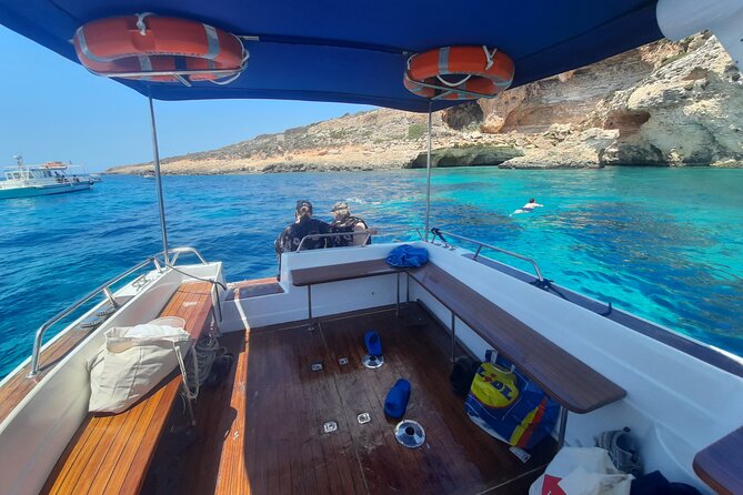 Boat Charters Blue lagoon, Crystal Lagoon, Comino, Malta 4hr trip - San Niklaw Bay closes the route