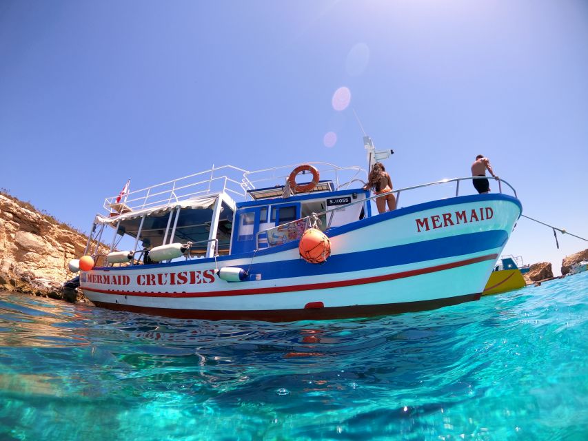 Bugibba: Scenic Sunset Cruise with Blue Lagoon Swim Stop - Cruising north with reggae and sea views