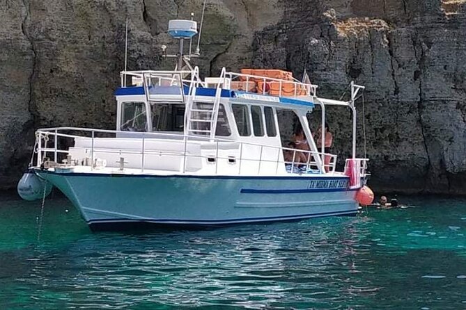 Comino Blue Lagoon and Gozo Private Boat Charter: Lucky Lady Boat - Blue Lagoon: spectacular water, busy setting