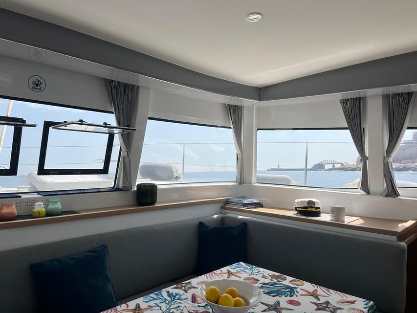 Evening Catamaran Charter - Sunset views, city lights, and Malta’s evening colors
