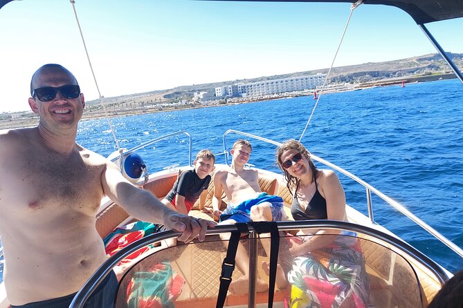 Family Private Boat Trip, Blue Lagoon, Malta, Comino & Gozo - Hondoq Bay and the first view of the coast
