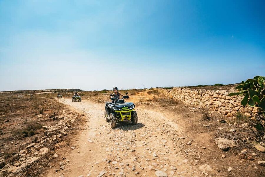 From Malta: Gozo & Comino Quad Bike & Boat Tour with Lunch - Sannap Cliffs bring the first big views