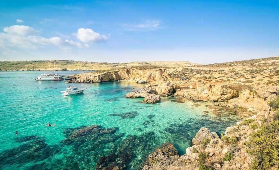 From Mellieha: Three Bay Cruise including the Blue Lagoon - Caves, rock shapes, and the ride home