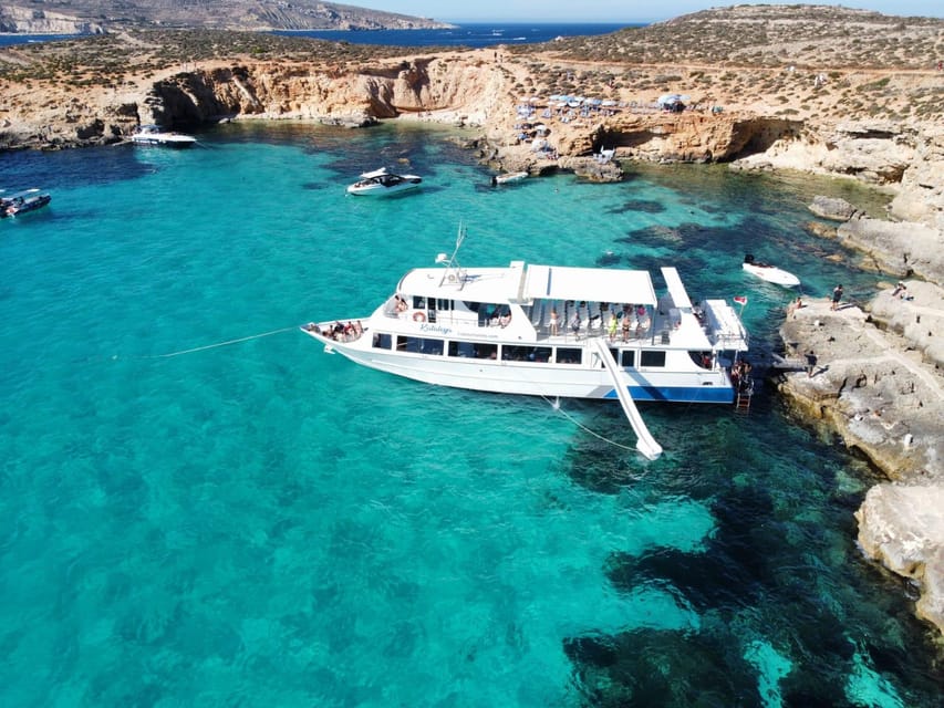 From Sliema: Gozo, Comino and Blue Lagoon Cruise - Cruising past the Santa Maria Caves