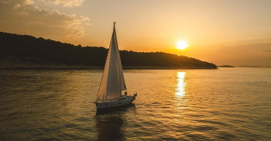 From Valletta: Romantic Sunset Cruise on a Sailing Yacht - Open Sea, Swimming, and a Quiet Anchorage