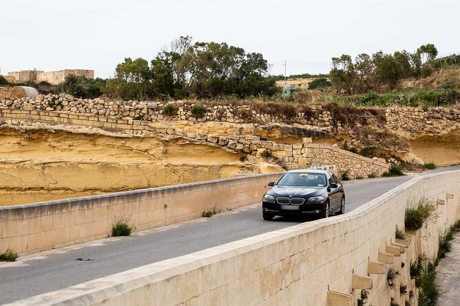 Gozo Highlights Tour in a comfortable private vehicle - Xwejni Salt Pans: A working coastal sight