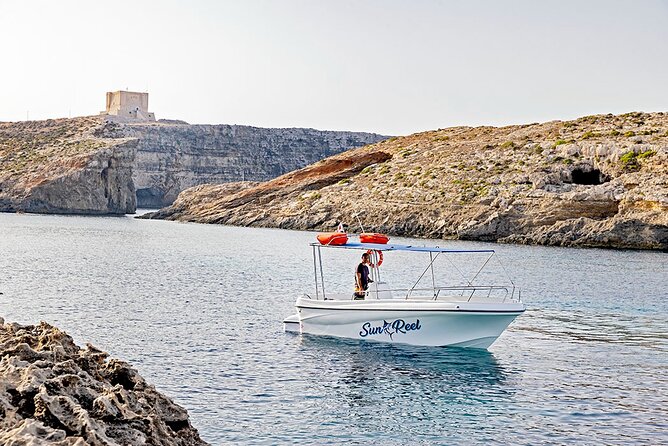 Half Day Blue Lagoon, Comino and Gozo Private Guided Boat Cruise - Santa Marija Caves beneath Comino’s cliffs