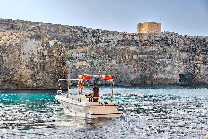 Half Day Blue Lagoon, Comino and Gozo Private Guided Boat Cruise - Halfa Rock and the return to Gozo