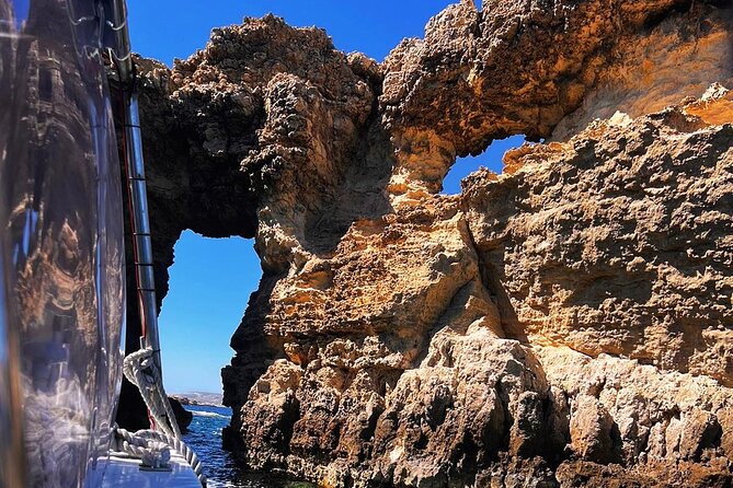 Half Day Malta Tour to Gozo Comino and Blue Lagoon Caves - Blue Lagoon: beautiful, famous, and crowded