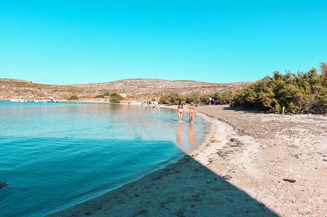 Half Day Malta Tour to Gozo Comino and Blue Lagoon Caves - Gozo Harbour and the northern Comino coast