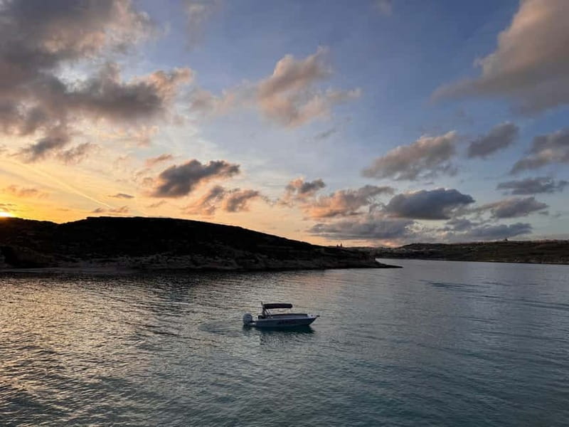 Malta: Blue Lagoon, Caves, Comino & Gozo Private Boat Trip - Santa Marija Caves show Comino at its most dramatic