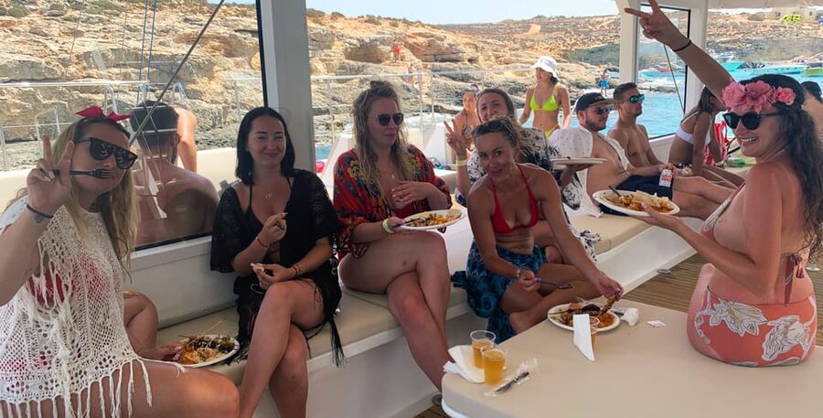 Malta: Blue Lagoon Evening Catamaran Cruise - Anchor Bay and Popeye’s Village from the water