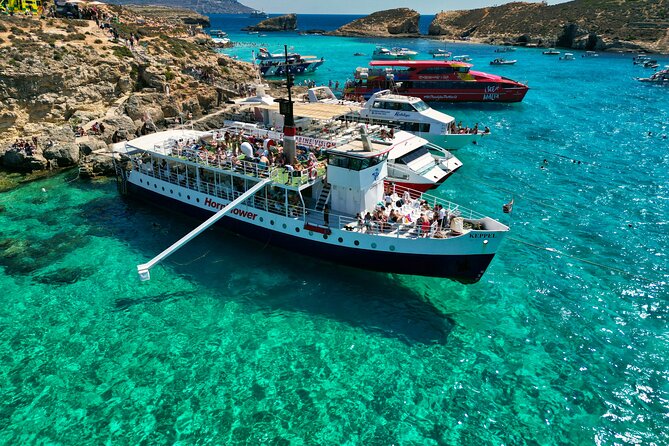 Malta: Comino, Blue Lagoon & Caves - swim, snorkel & slide - Setting off from Bugibba Jetty at 10am