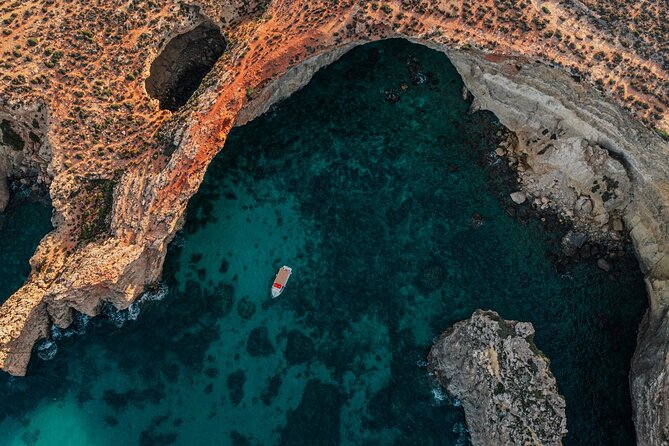 Mellieha: Gozo, Comino, Sea Caves, and Blue Lagoon Cruise - Sea caves, Santa Marija Bay, and unusual rock
