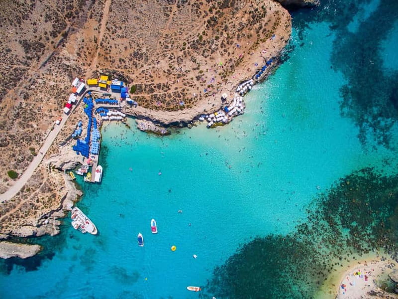 Mellieha: Round Comino, Blue Lagoon & Gozo Cruise with Water - Returning past Gozo and Mġarr Harbour