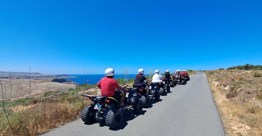 North Malta: Quad Bike Tour with Scenic Land, Sea & Swimming - Mellieha village brings the tour back to daily life
