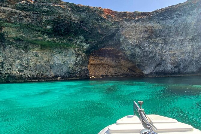 Private Boat Tour to Blue Lagoon Comino Caves and Gozo - Caves, cliffs, and the historic watchtower
