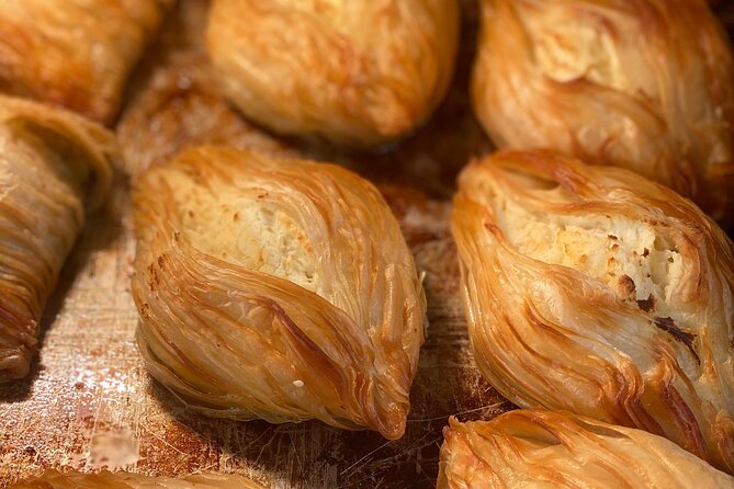 Valletta Food Tour - Eat like a local - Walking through Valletta with food in hand